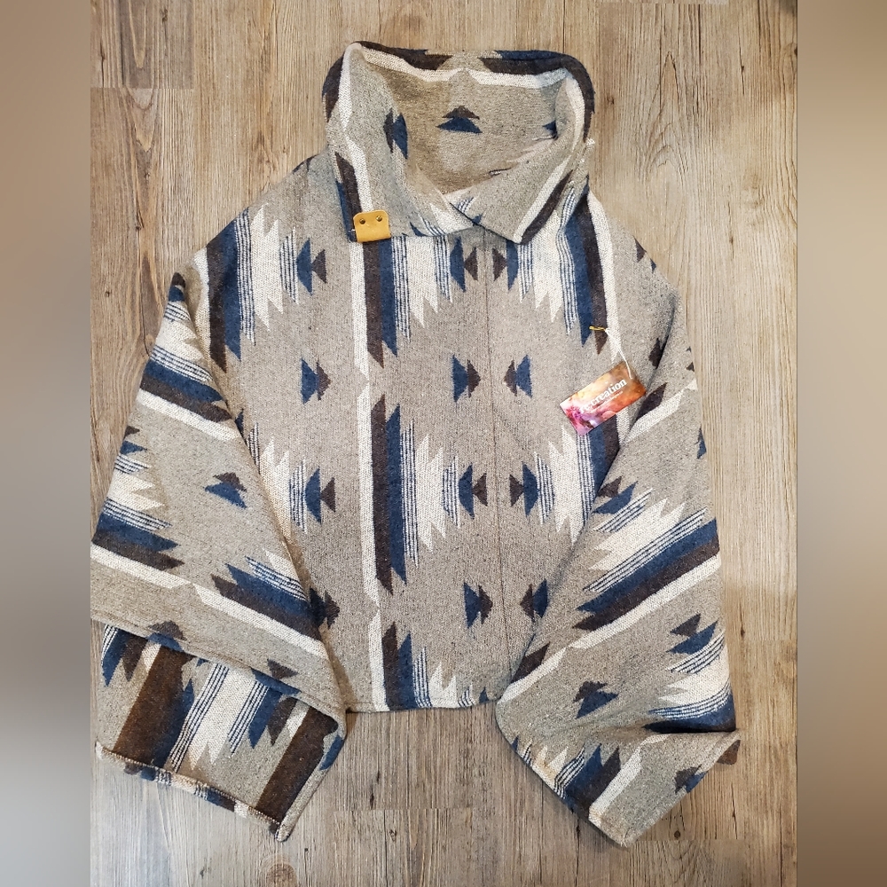 Adorable cape/poncho brand new